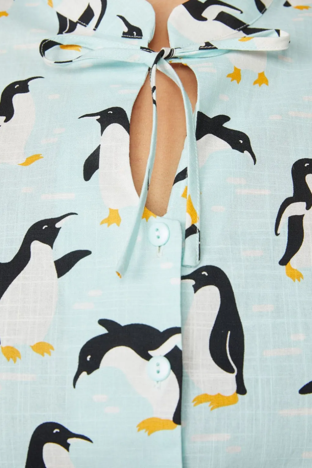 Curve Penguin Blouse